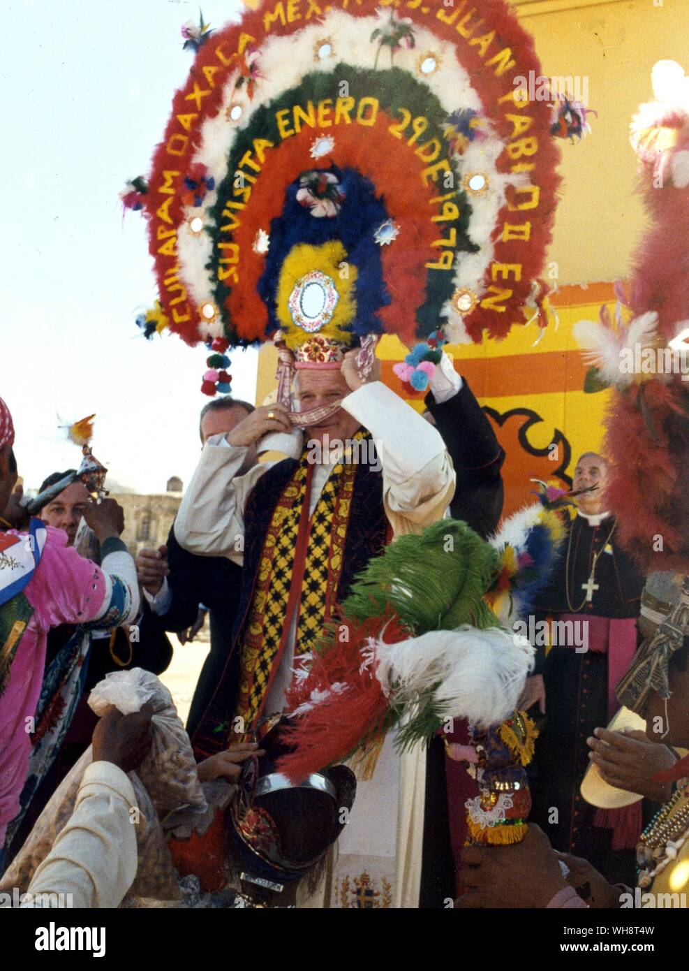 Pope John Paul II wearing an elaborate feather headdress on his visit to Mexico in 1979 Stock Photo