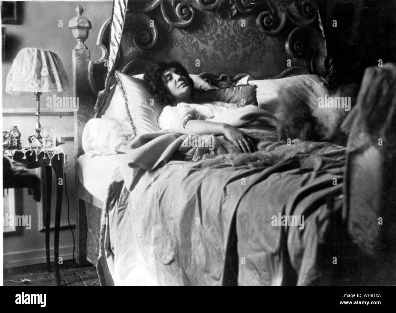 Mrs Patrick Campbell in her bed photographed by GB Shaw Stock Photo