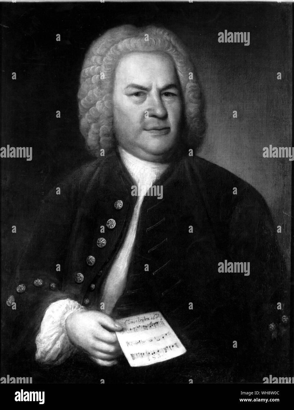 Painting of German composer Johann Sebastian Bach (1685-1750) by Elias Gottlob Haussmann 1746. Bach is shown from the waist up, holding a sheet of music. Frederick the Great by Nancy Mitford, page 154. Stock Photo