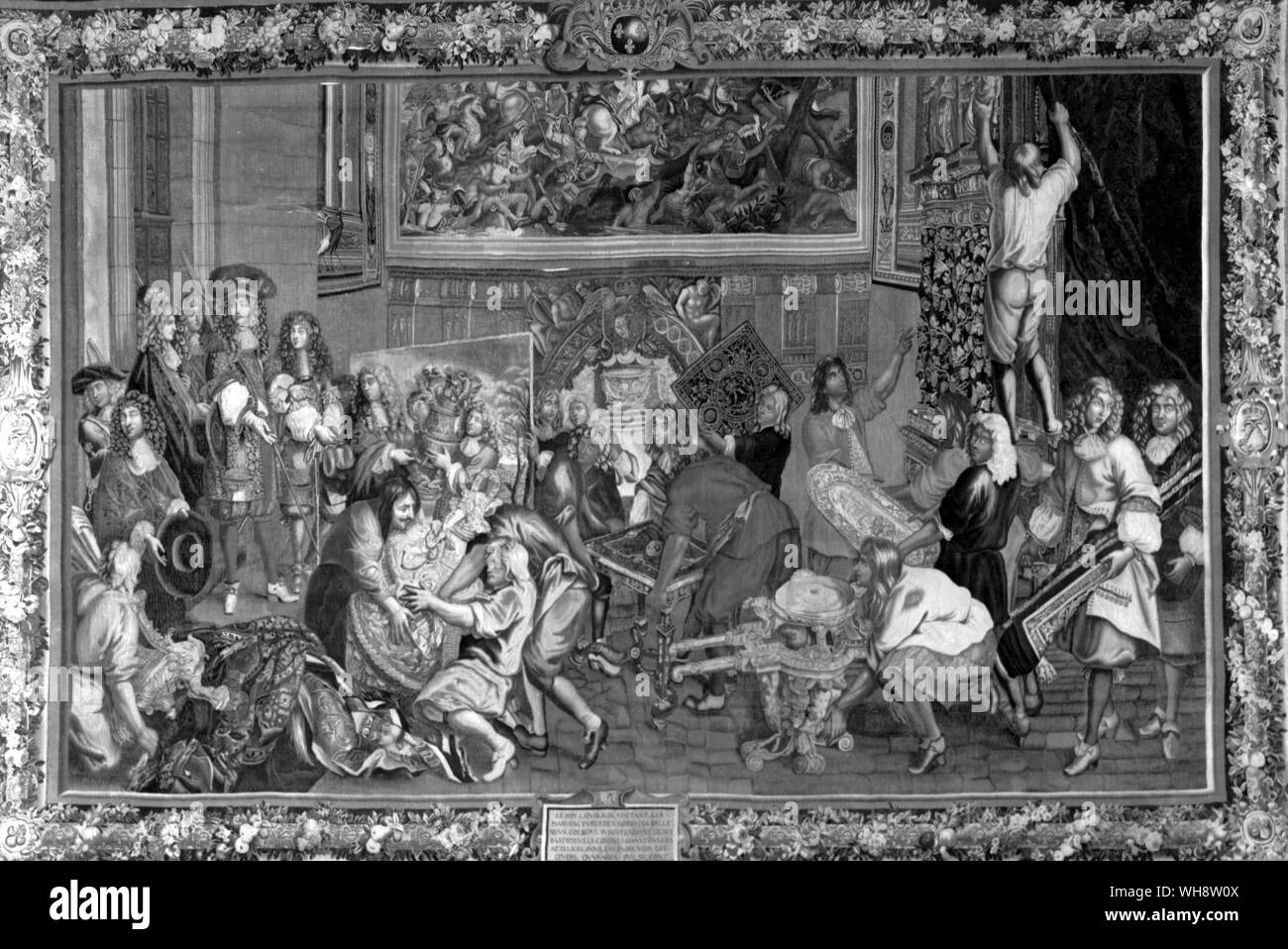 Louis XIV called the Sun King 1638-1715 King of France from 1643 visiting the Gobelins Manufactory 15 October 1667, tapestry after Charles Le Brun. Le Brun is presenting the craftsmen to the king Stock Photo