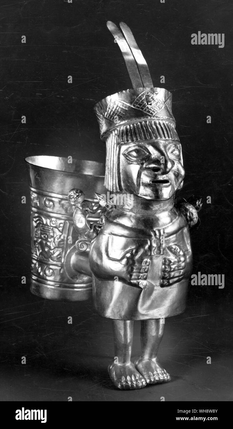 Peruvian ornament of precious metal - gold whistling vase Stock Photo
