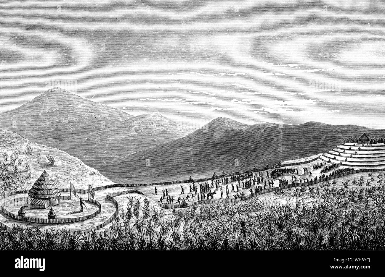 Rubanga, Mutesa'a new capital: '...situated in the centre of an amphitheatre formed by seven high walls or palisades through which entrance is had by opposing gates to which cow bells are attached.' (Chaille-Long) From a sketch by Chaille-Long. Stock Photo