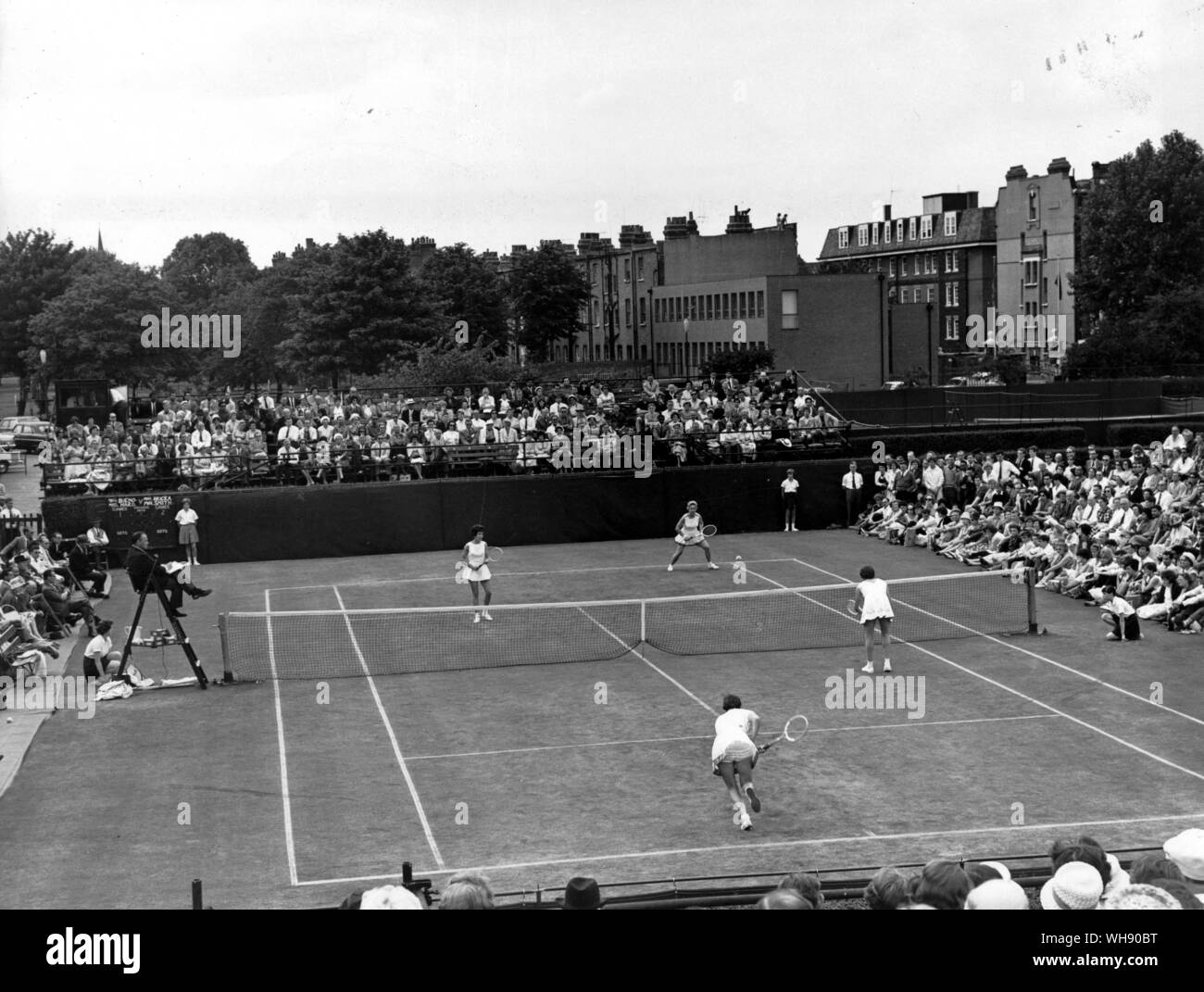 Queens Club: London Grass Court Championships. J Bricka (near left), M Smith v. M Bueno (far left) and D Hard in 1962. Stock Photo