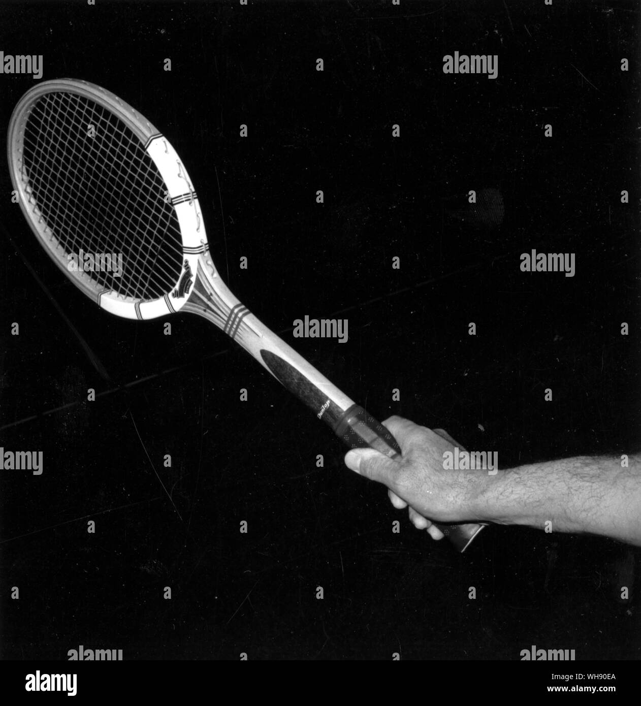 The eastern backhand drive grip. The forefinger is spread slightly and the thumb placed across the back of the handle.. Stock Photo