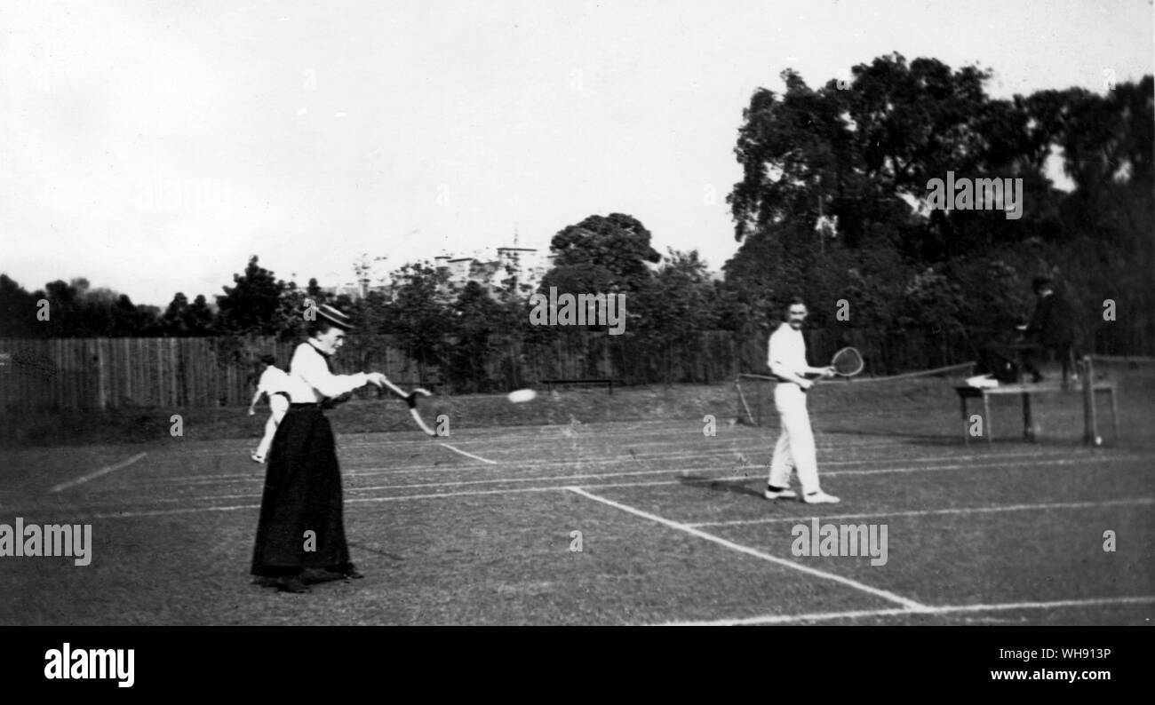 Mrs Atkins (Miss H Jackson), Scottish Ladies' singles champion 1890-2 and A W Gore, Scottish men's singles champion in 1892-3, playing at Dyvours, Edinburgh in 1892. Gore was an outstanding baseliner and competed at Wimbledon every year from 1888 to 1927, winning the single's titles three times, 1901, 1908, 1909. Stock Photo
