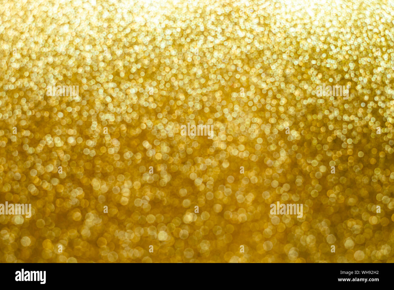 Abstract gold glitter background. Sparkle gold bokeh christmas background  or wallpaper Stock Photo - Alamy