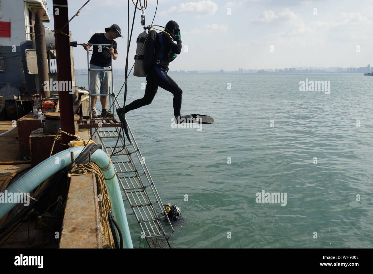 (190902) -- WEIHAI, Sept. 2, 2019 (Xinhua) -- Undated photo shows members of an archaeological team conducting an underwater survey in the Yellow Sea. Chinese archeologists said Monday they have confirmed the wreck site of a Chinese battleship sunk in the Yellow Sea by the invading Japanese fleet in 1894. (Underwater Cultural Heritage Conservation Center of China National Cultural Heritage Administration/Handout via Xinhua) Stock Photo