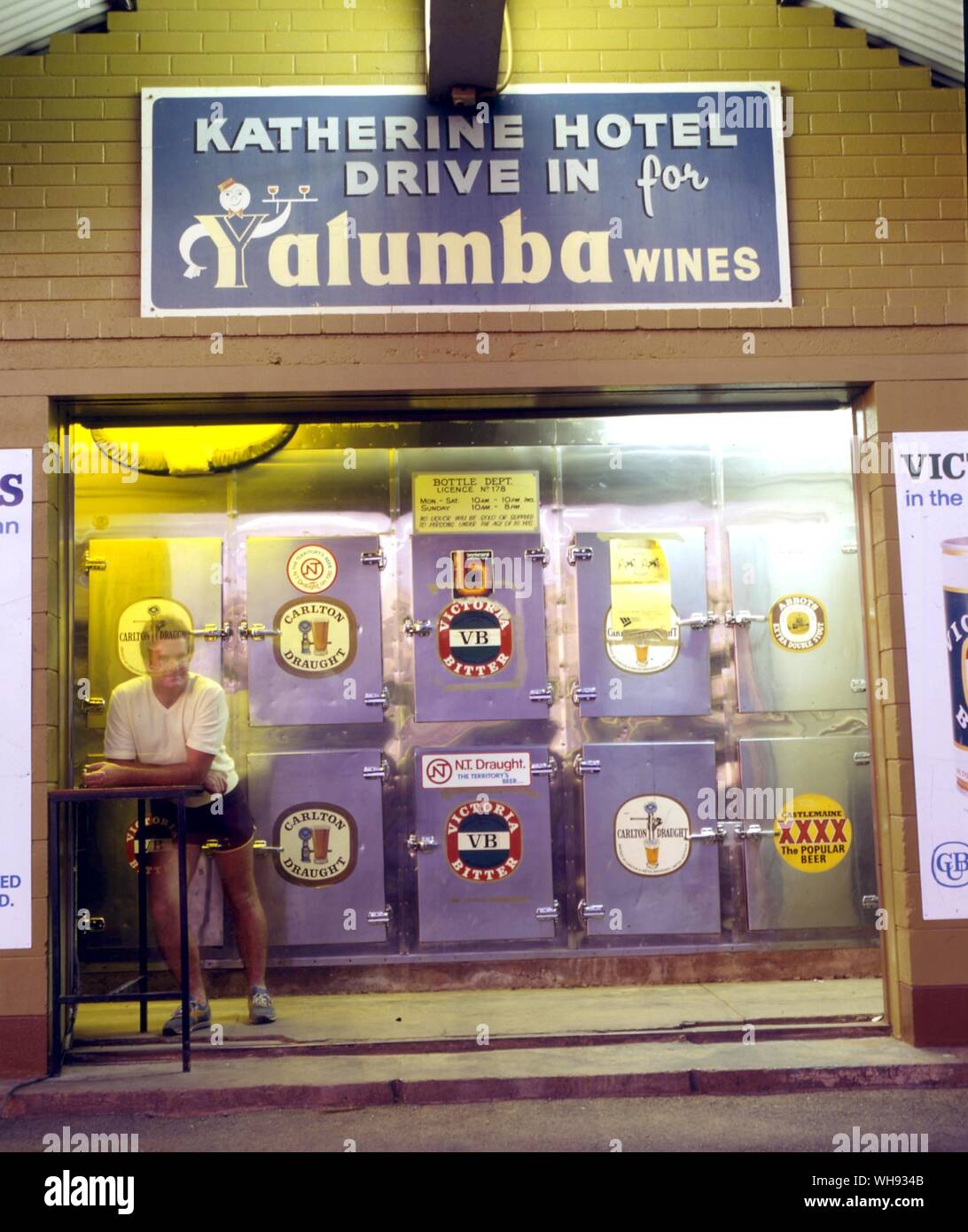The ten doors of a Katherine liquor drive in offer a selection of Austrlia's best beers in the tropic night Stock Photo
