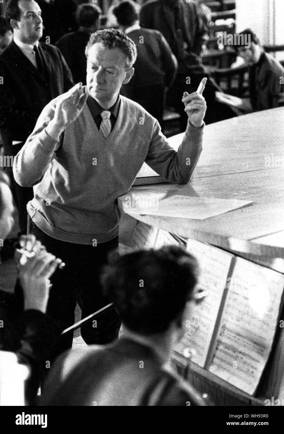 Benjamin Britten rehearsing his church parable, Curlew River for the 1964 Aldeburgh Festival where many of his works both orchestral and operatic were first performed.. Stock Photo