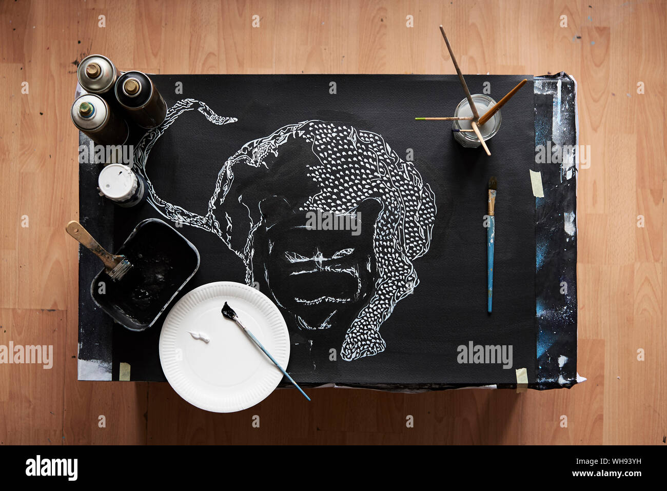 Overhead of artist studio with painting in progress Stock Photo Alamy