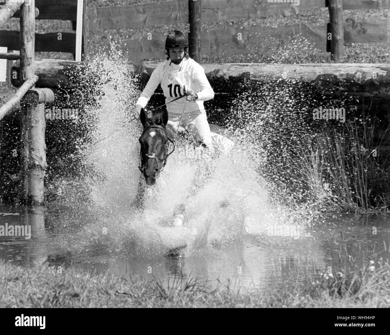 September 1972: Munich Olympics: Bridget Parker takes the water jump during the cross-country stage on the horse, 'Cornish Gold' in the 3-day event. She finished 10th after the dressage and cross-country events.. Stock Photo