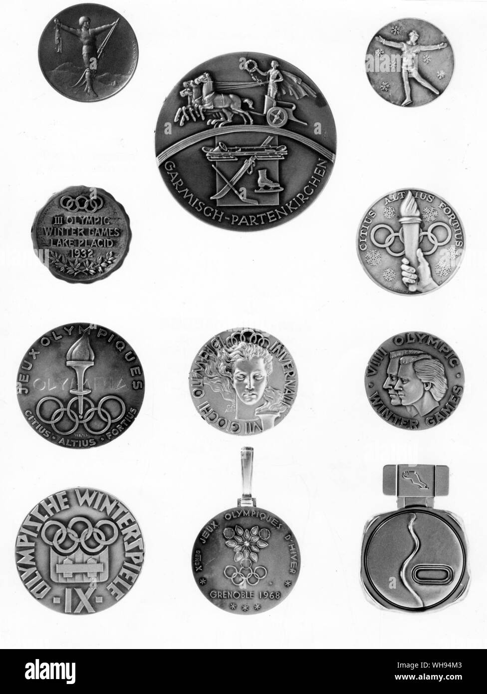 Winter Olympic Games medals.. Column 1 (left), top-bottom: France, Chamonix 1924. USA, Lake Placid 1932. Norway, Oslo 1952. Austria, Innsbruck, 1964. Column 2 (middle), top-bottom: Germany, Garmisch 1936. Italy, Cortina D'Ampezzo 1956. France, Grenoble 1968. Column 3 (right), top-bottom: Switzerland, St Moritz, 1928. Switzerland, St Moritz, 1948. USA, Squaw Valley, California 1960. Japan, Sapporo 1972 Stock Photo