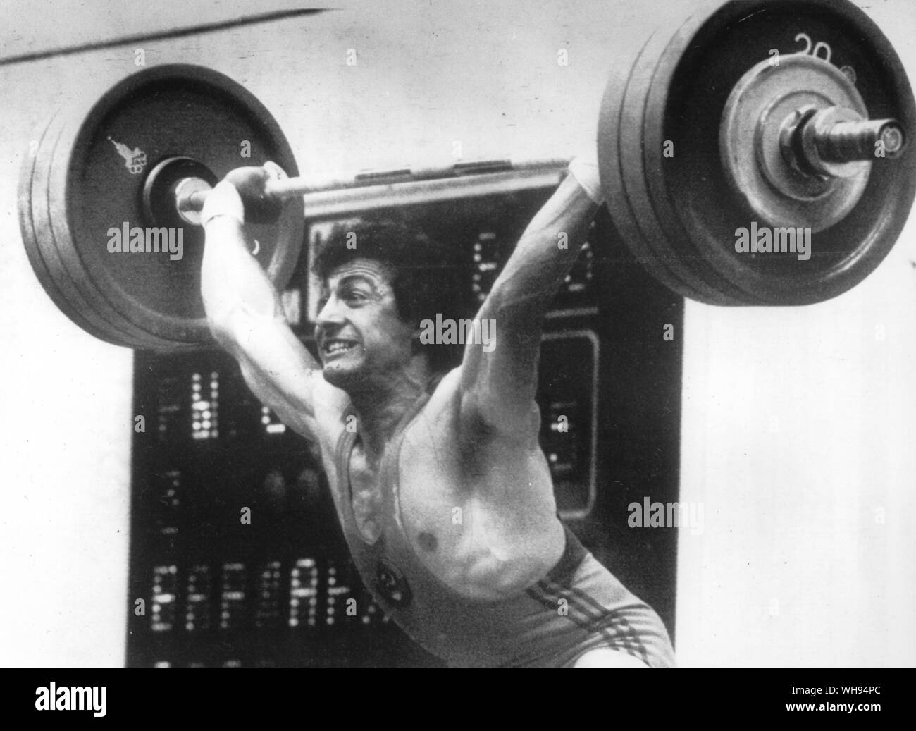 The Soviet Unions Yurik  Vardanyan strains during his gold medal winning lift Stock Photo