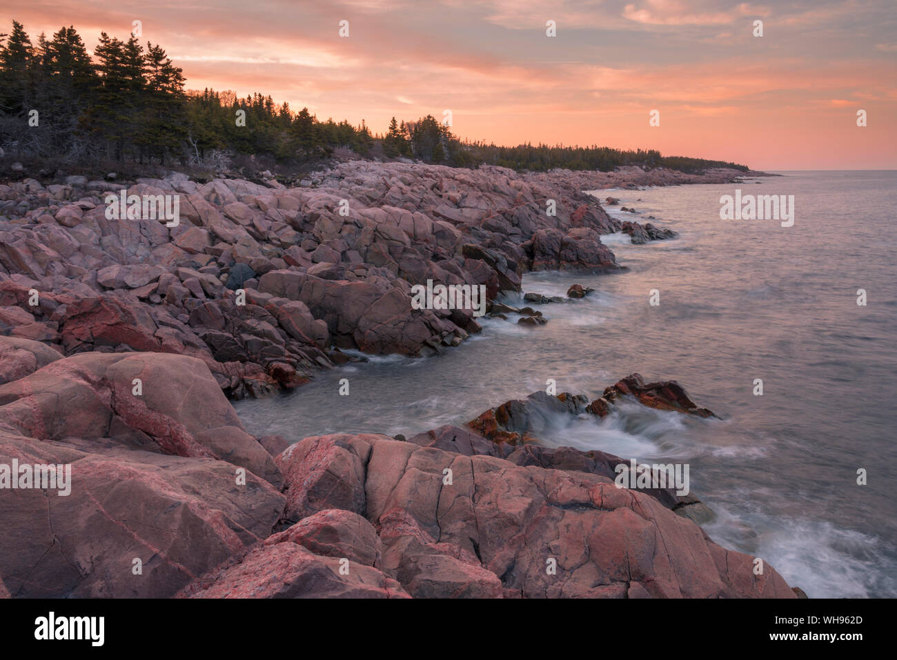 Waves and rocky coastline at sunset, Lackies Head and Green Cove, Cape Breton National Park, Nova Scotia, Canada, North America Stock Photo