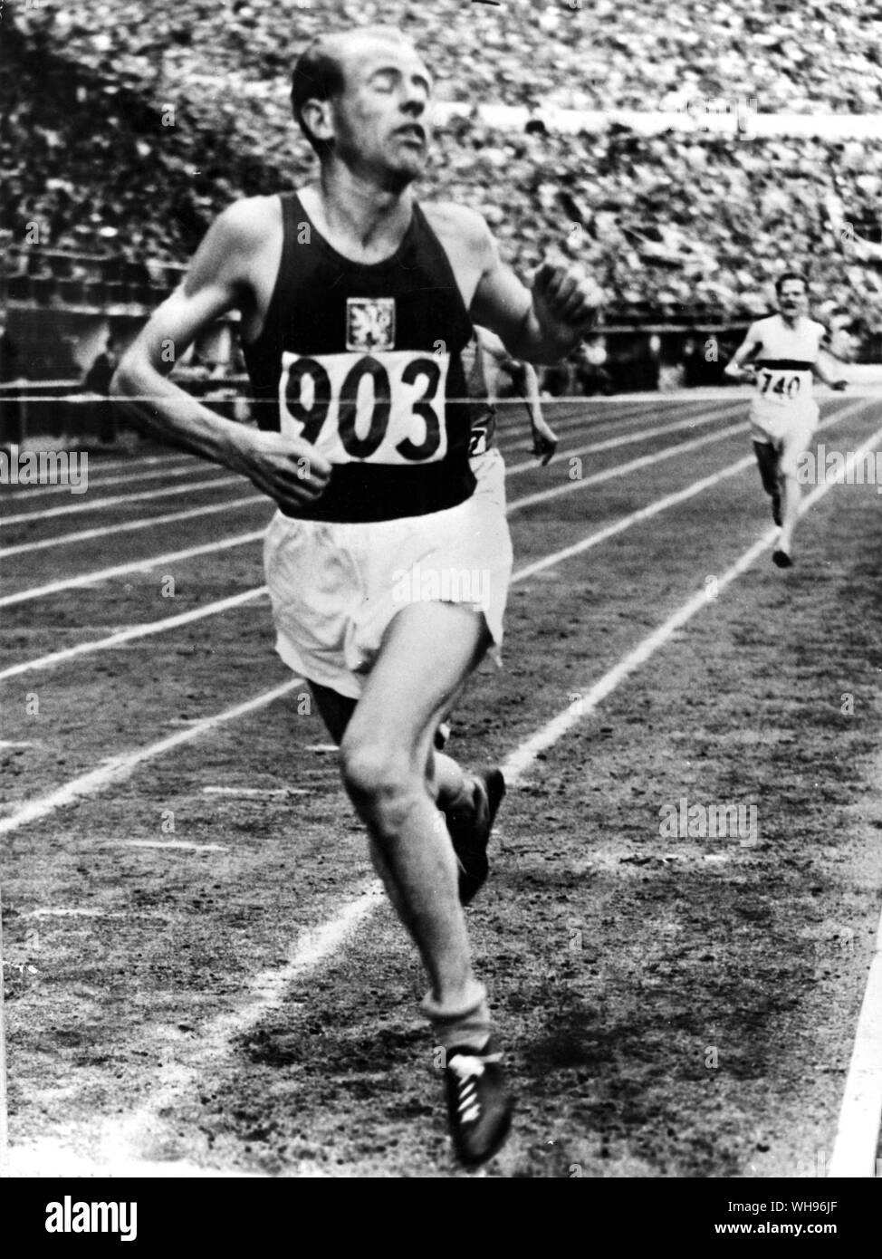 Finland,Helsinki/ Olympics,1952: Emil Zatopek of Czechoslovakia, winner of four gold medals wins the 5000 metres.. Stock Photo