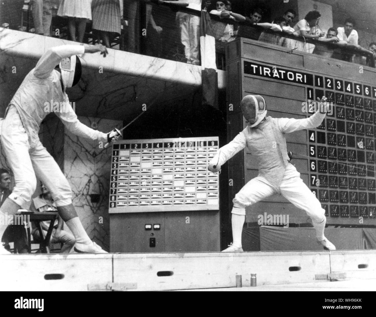 Italy, Rome, Olympic Games, 1960: Viktor Zhdanovich (USSR) is shown in action versus Parulski of Poland in the semi-final of the foils fencing contest. He went on to win the gold medal.. Stock Photo