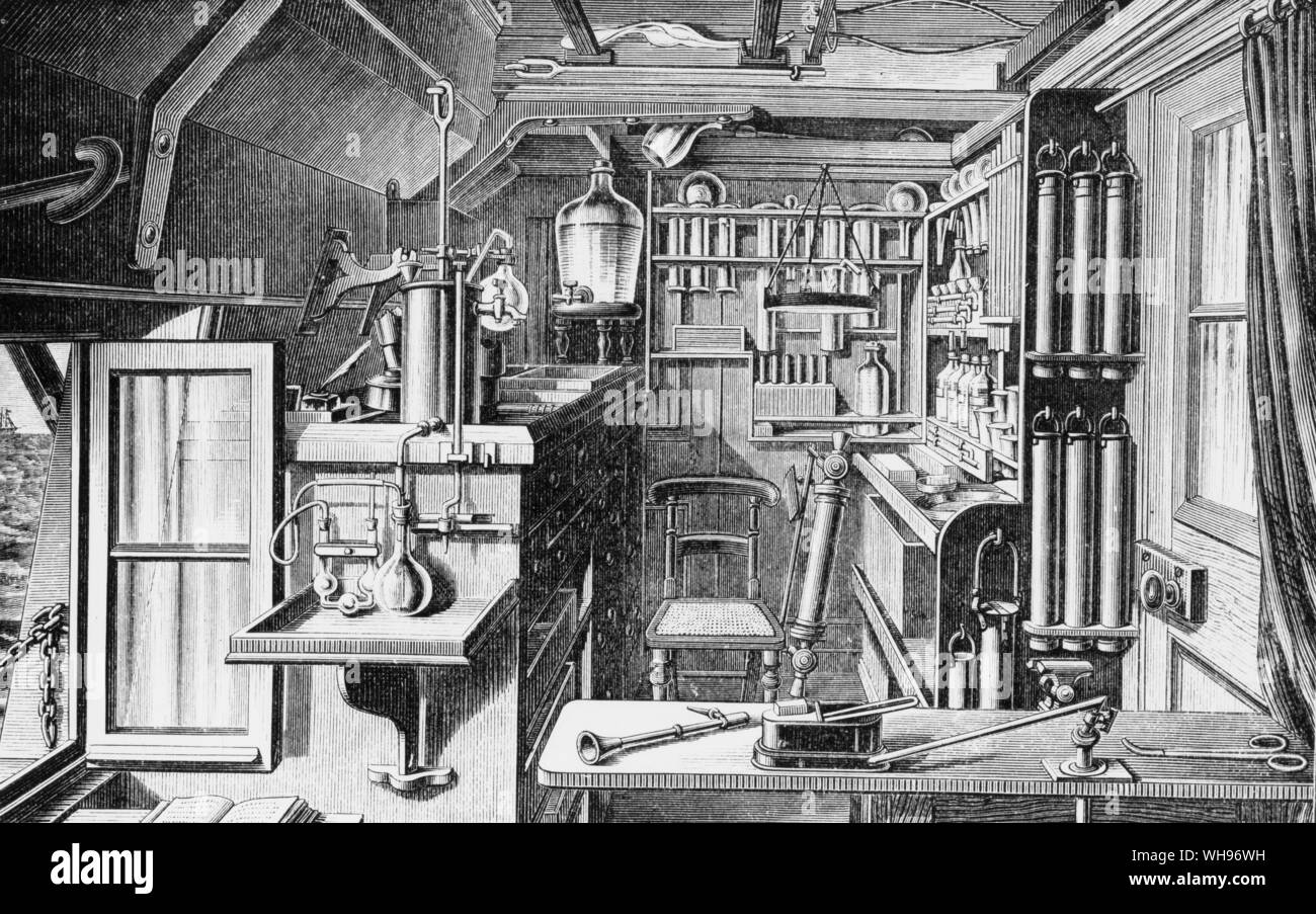 'Chemicals in drawers and jars in racks, all secured from accident from the rolling of the ship by many ingenious devices.' Space, too, was ingeniously devised and the chemical laboratory was installed in a gun bay. Stock Photo