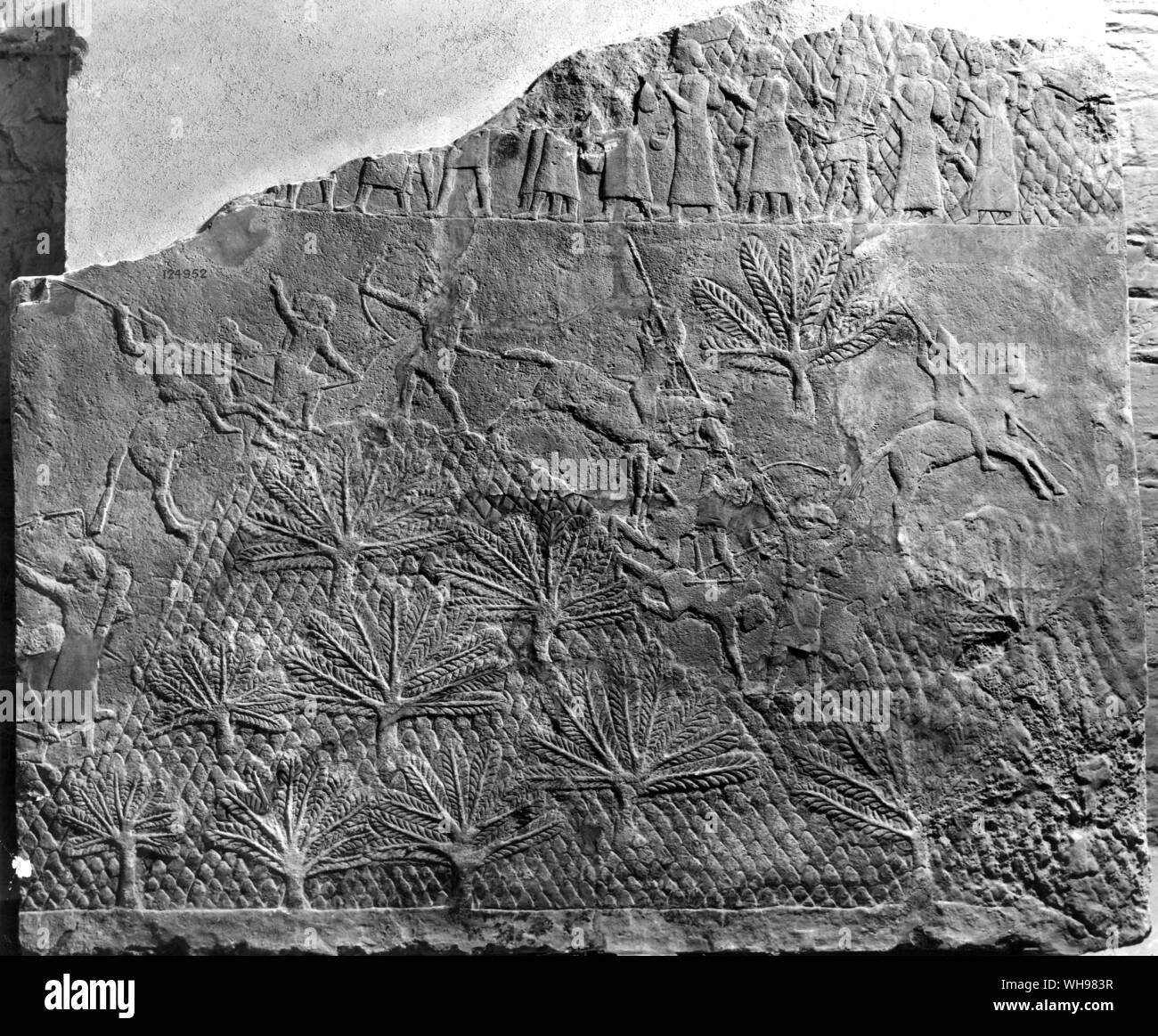 Ancient warfare/Assyria. Palace of Sennacherib. Relief showing cavalry chasing the enemy over steep hills. Stock Photo