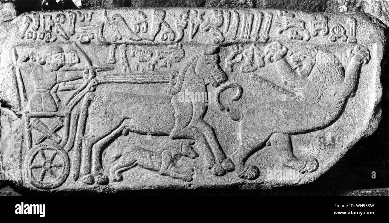 Ancient warfare/ Mesopotamia. Hittite relief showing archer and chariot.. Stock Photo