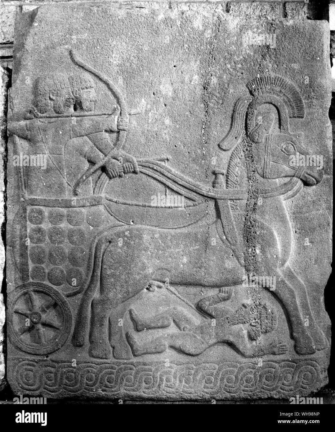 Eastern warfare/ Hittite relief of an archer in a chariot.. Stock Photo
