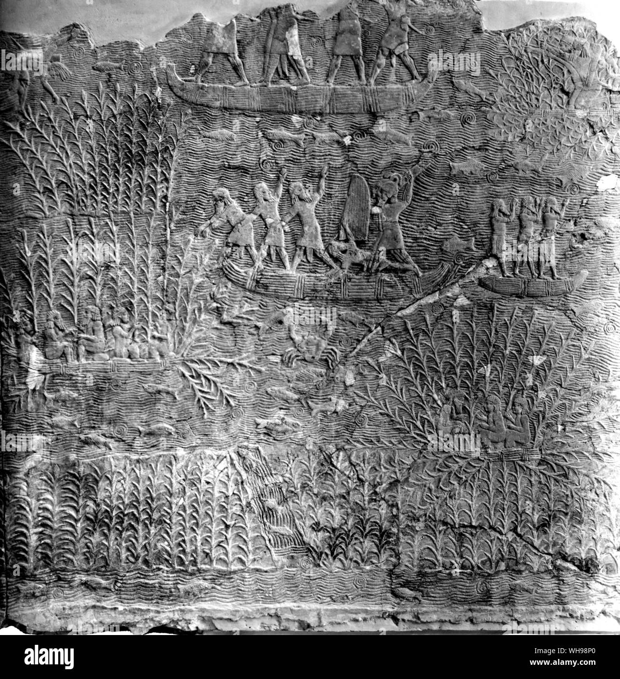 Ancient warfare: An attack on marsh dwellers in southern Mesopotamia. relief from the palace of Sennacherib (south west) at Kuyunjik (Ninevah) 704-681 B.C. Stock Photo
