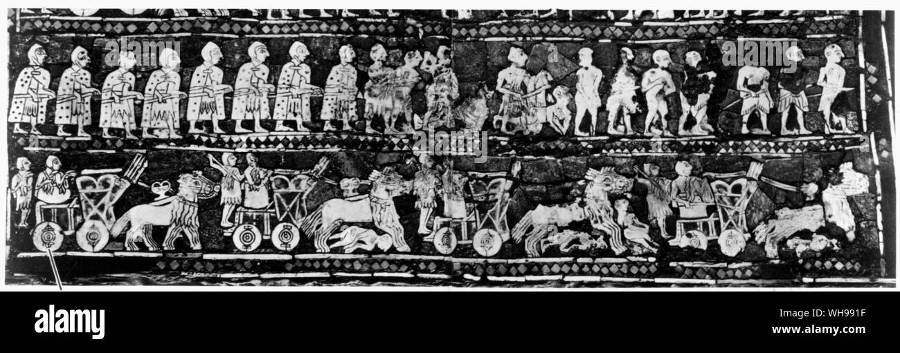 Ancient warfare/Mesopotamia: Chariots were the basic instruments of Mesopotamian warfare. Babylonian four-wheeled chariots drawn by four asses. The soldiers are wearing mail coats.. Stock Photo