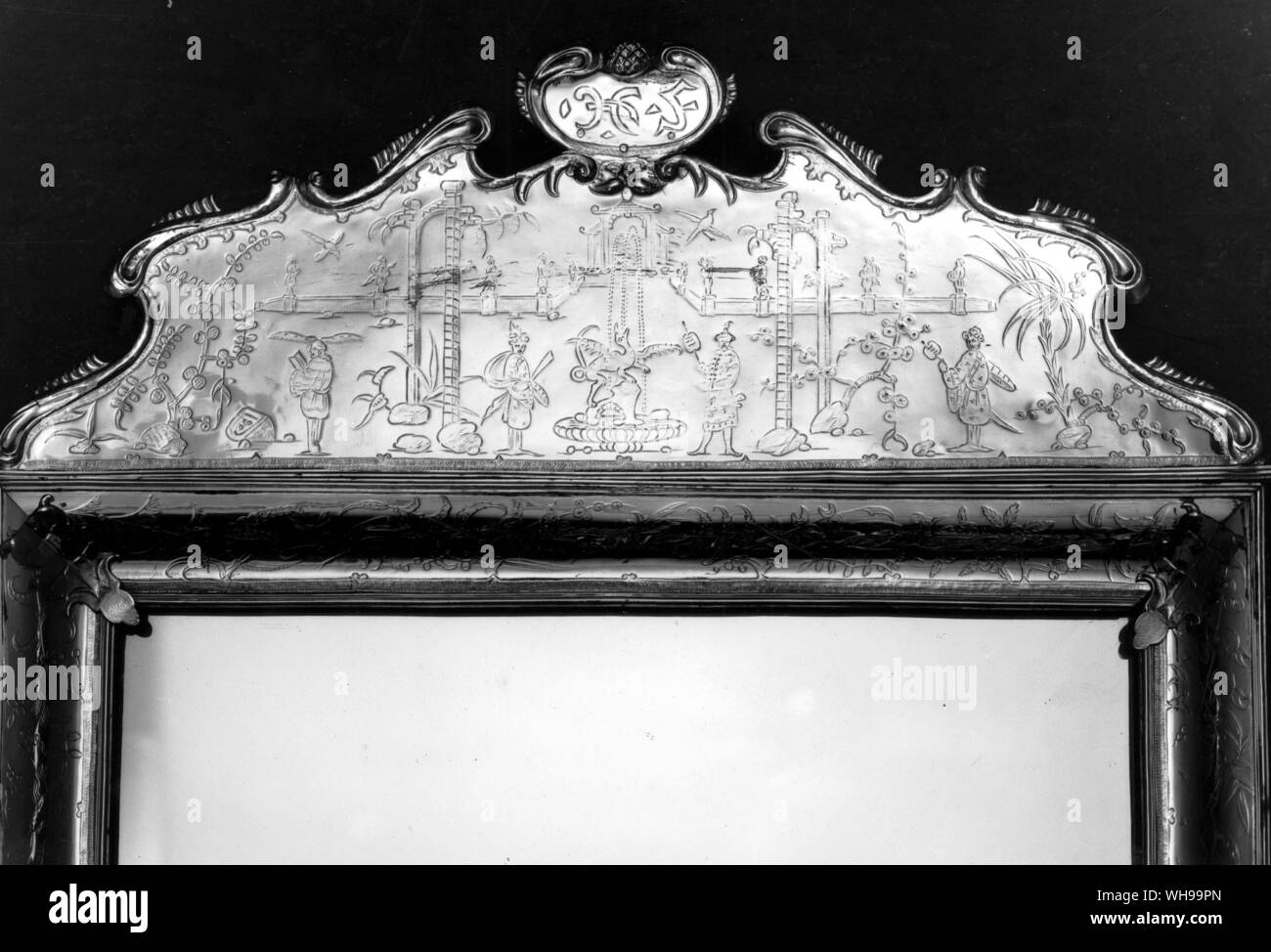 Cresting of a silver toilet mirror c.1680 by Robert Smythier with pre-rococo-chinoiserie scenes Stock Photo