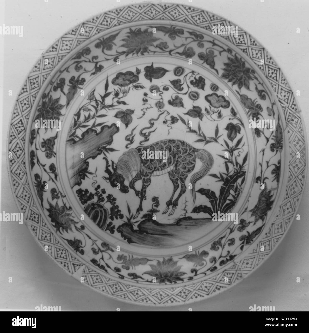 Yuan (Mongol) dynasty early 14th century porcelain dish of a type that occasionally reached Europe in the late 14th and 15th centuries, but was much more common in the Near East. Stock Photo