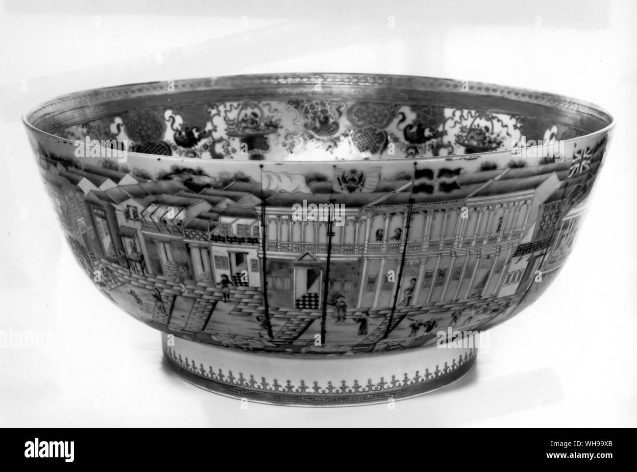 The European nations' trading posts (factories) at Whampoa, Canton, as shown on a late 18th century Chinese punch bowl, itself copying a European engraving. The flags of britain, Sweden and Austria can be seen. Stock Photo