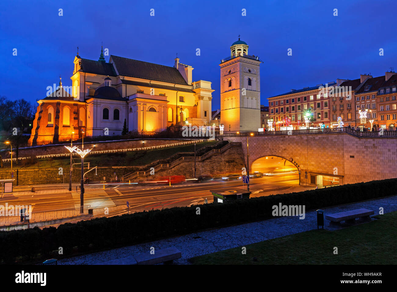 St. Anne's Church at night, Solidarity Avenue with tunnel under the Old Town, Warsaw, Poland Stock Photo