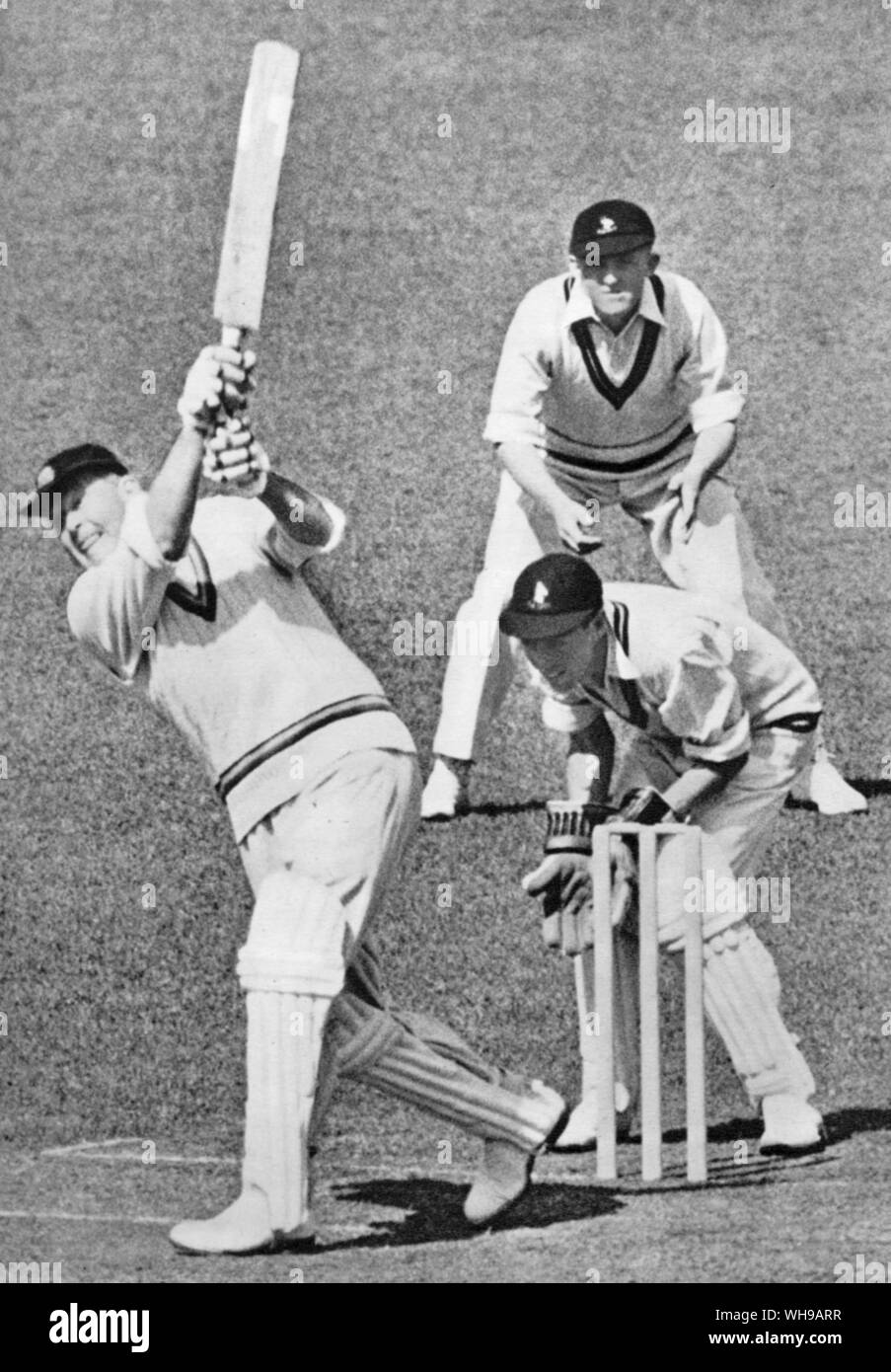Freddie R Brown makes a full blooded drive off G W A Chubb (South Africa) at Lords 1951 Stock Photo
