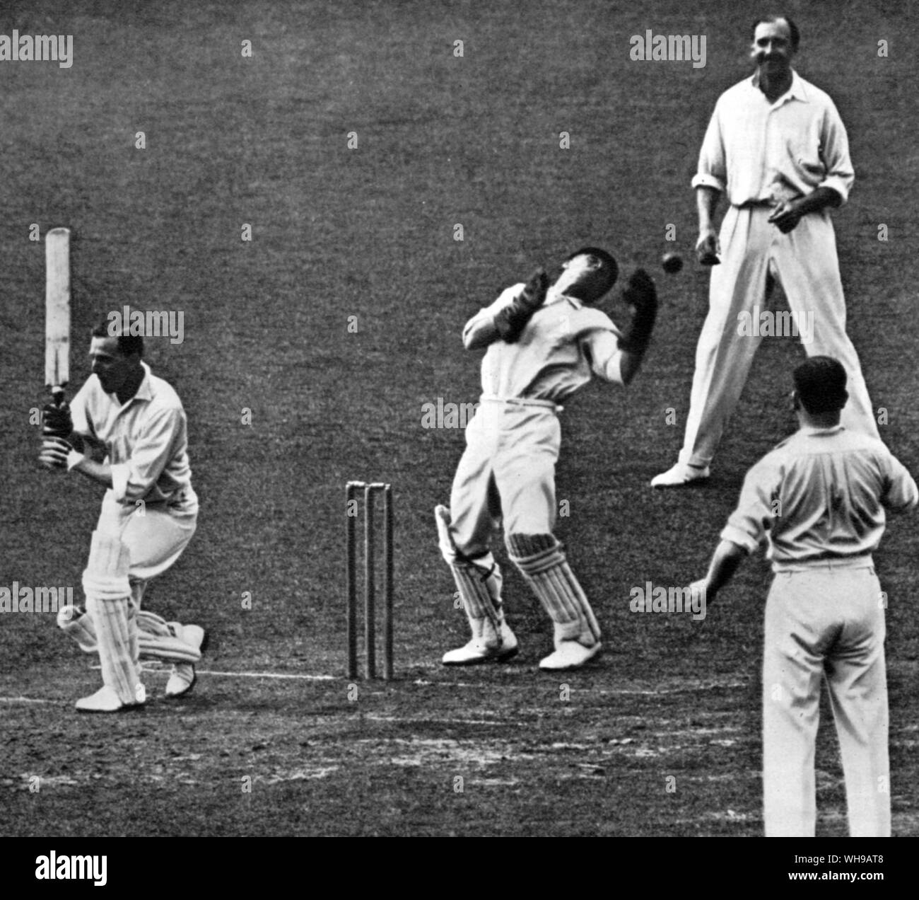 George Gunn being missed by H Strudwick the Surrey wicket keeper at the Oval 1927 P G H Fender is fielding slip Stock Photo