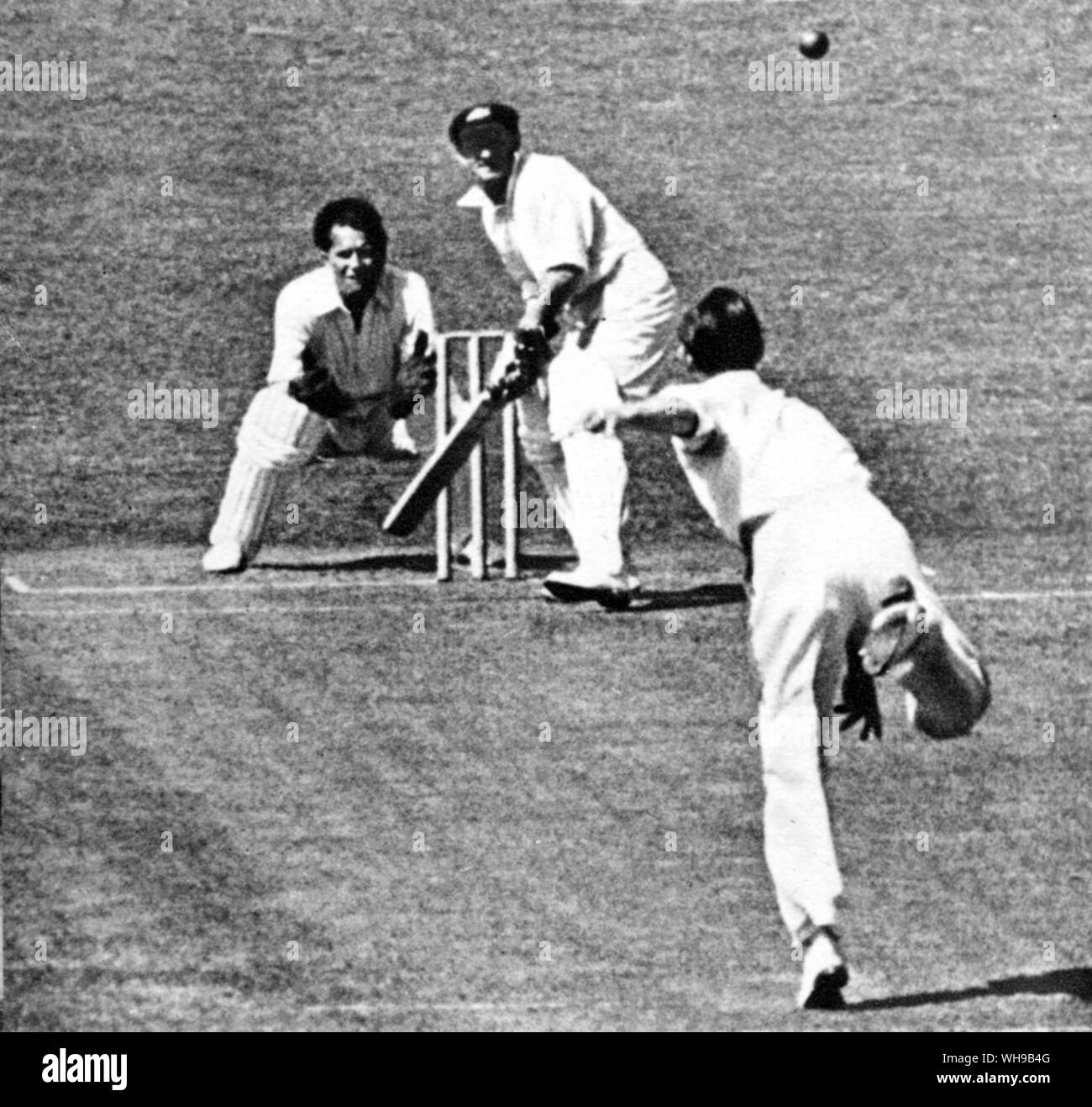 Sir Don G Bradman batting against Essex at Southend in 1948. Peter Smith is the bowler  F Rist is keeping wicket Stock Photo