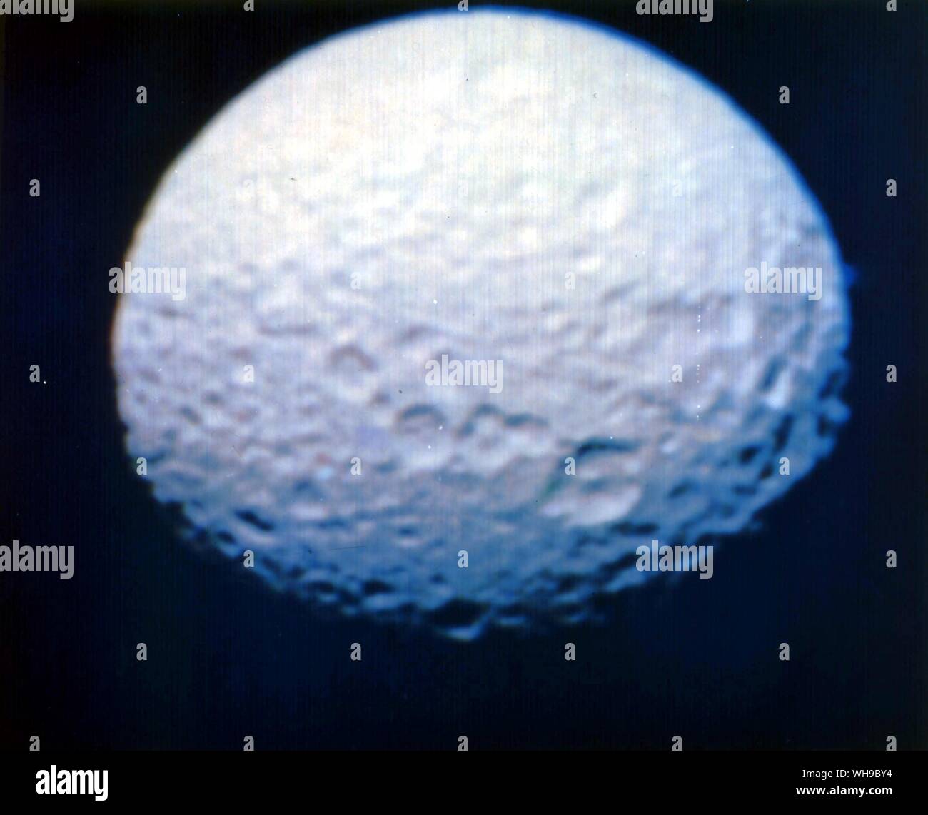 Space Saturn. MIMAS satellite from Voyager. Stock Photo