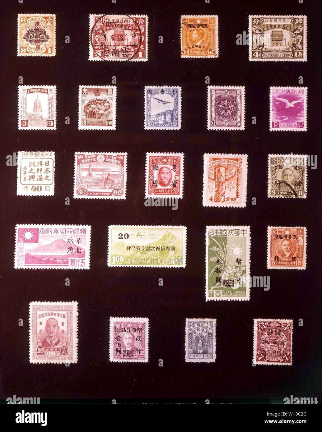ASIA - CHINESE PROVINCES: (left to right) 1. Sinkiang, 1 dollar, 1915, 2. Yunnan, 1 dollar, 1929, 3. Szechwan, 40 cents, 1933, 4. Kirin and Heilungchang, 4 cents, 1929, 5. Manchukuo, 3 fen, 1934, 6. Manchukuo, 13 fen, 1937, 7. Manchukuo, 39 fen, 1937, 8. Manchukuo, 2.5 fen, 1937, 9. Manchukuo, 2 fen, 1940, 10. Manchukuo, 40 fen, 1944, 11. Kwangtung, 3 sen, 1936, 12. Kwangtung, 30 cents, 1942, 13. Mengkiang, 4 cents, 1943, 14. North China, 4 cents, 1942, 15. Shanghai and Nanking, 5 yuan, 1944, 16. Shanghai and Nanking, 20 sen. 1941, 17. Shanghai and Nanking, 30 yuan, 1945, 18. Formosa, 5 sen, Stock Photo