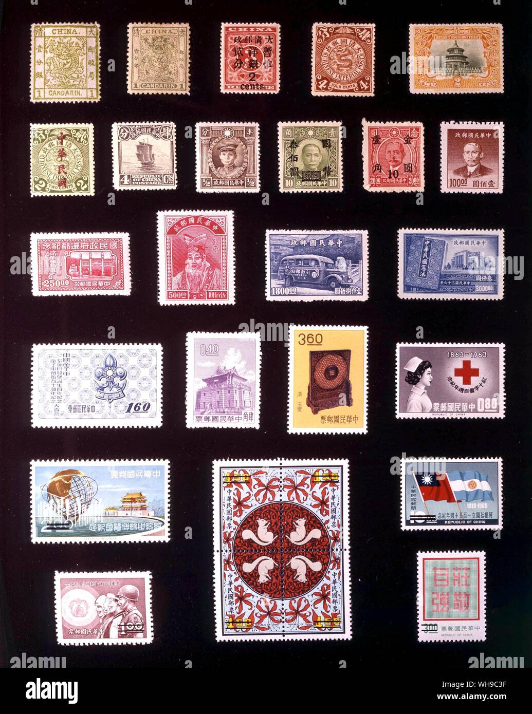 ASIA - CHINA: (left to right) 1. 1 candarin, 1878, 2. 1 candarin, 1885, 3. 2 cents, 1897, 4. 4 cents, 1898, 5. 2 cents, 1909, 6. 2 cents, 1912, 7. 4 cents, 1923, 8. 0.5 cent, 1932, 9. 300 yuan, 1946, 10. 10 cents, 1948, 11. 100 yuan, 1949, 12. 250 yuan, 1947, 13. 500 yuan, 1947, 14. 1,800 yuan, 1947, 15. 3,000 yuan, 1947, 16. 1.60 yuan, 1957, 17. 40 cents, 1960, 18. 3.60 yuan, 1962, 19. 80 cents, 1963, 20. 2 yuan, 1965, 21. 10 yuan, 1966, 22. 1 yuan, 1969, 23. 4.50 yuan, 1971, 24. 3 yuan, 1972. Stock Photo