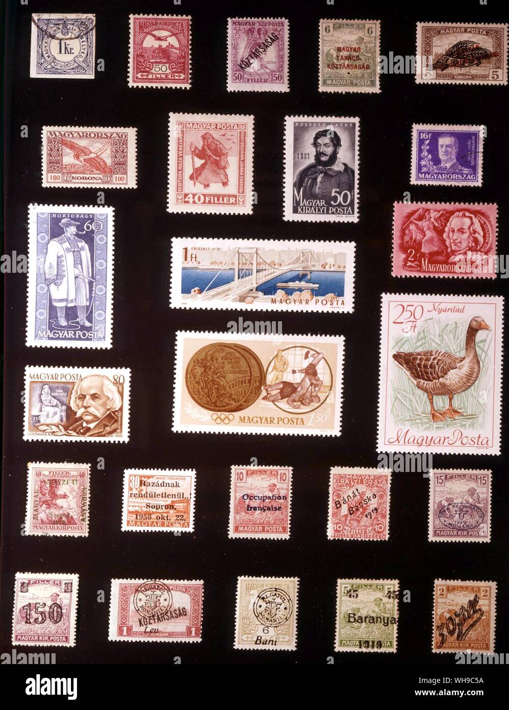 EUROPE - HUNGARY: (left to right) 1. 1 krajczar, newspaper stamp, 1868, 2. 50 filler, 1900, 3. 50 filler, 1918, 4. 6 filler, 1919, 5. 5 korona, 1920, 6. 100 korona, 1924, 7. 40 filler, 1920, 8. 50 filler, 1944, 9. 16 filler, 1930, 10. 60 filler, 1963, 11. 1 forint, 1964, 12. 2 filler, 1948, 13. 80 filler, 19653, 14. 1.50 forint, 1965, 15. 2.50 forint, 1968, 16. Szeged, 40 filler, 1919, 17. Sopron, 30 filler, 1956, 18. French occupation, 10 filler, 1919, 19. Banat Bacska, 10 filler, 1919, 20. Debrecen, 15 filler, 1919, 21. Temesvar, 150 on 3 filler, 1919, 22. Transylvania, 1 leu surcharged on Stock Photo
