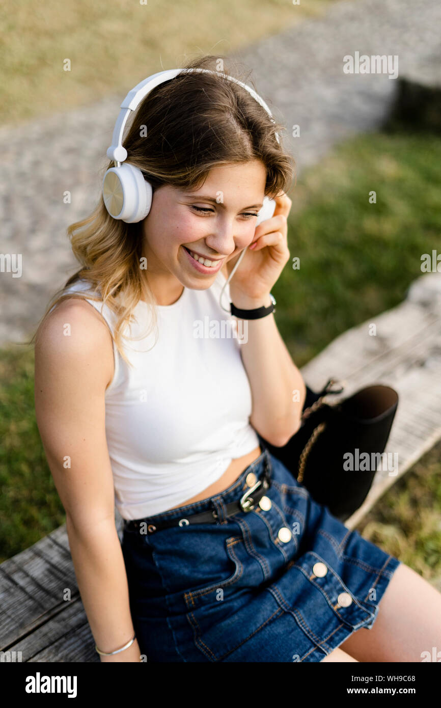 Happy relaxed woman headphones hi-res stock photography and images - Alamy