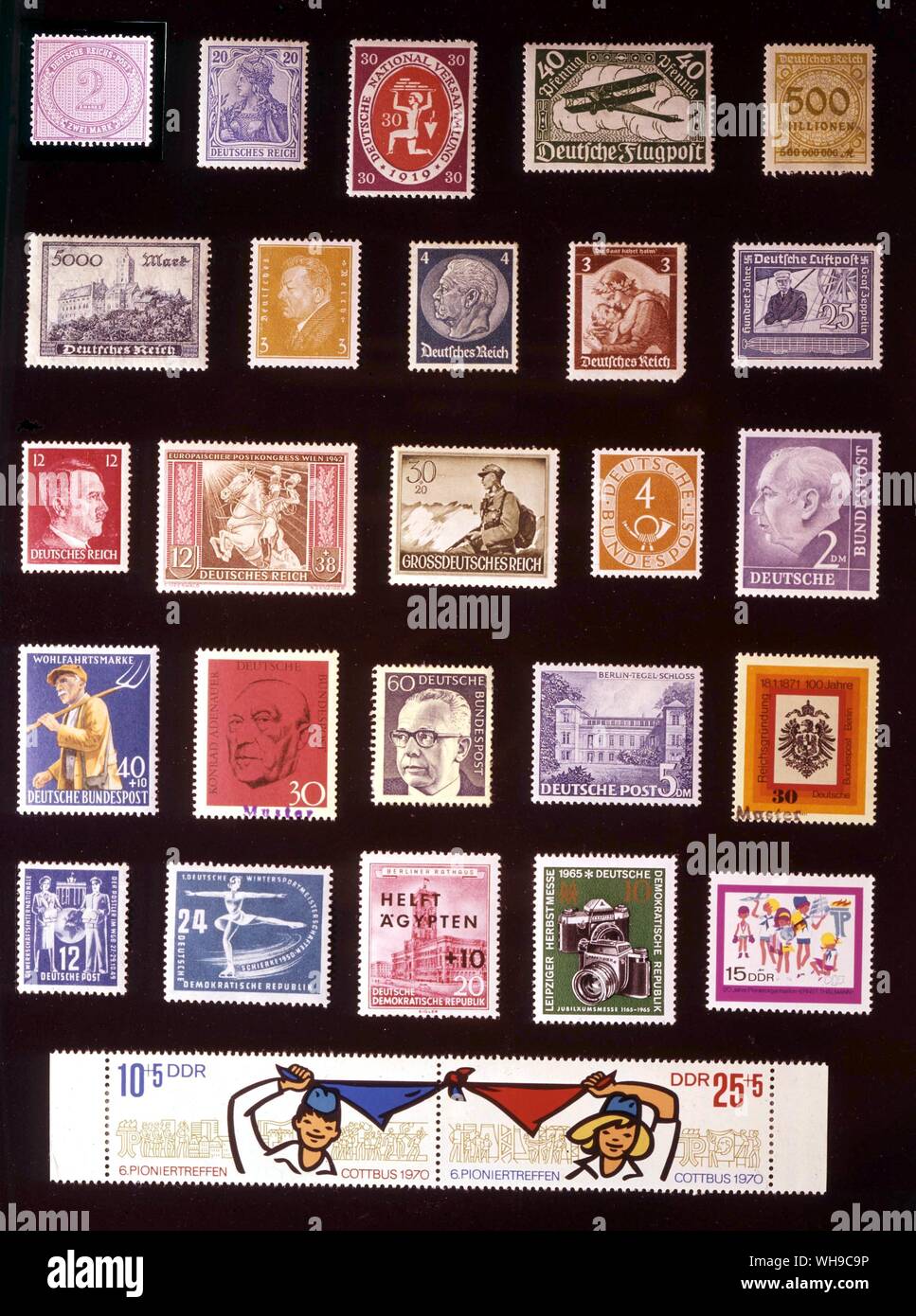 EUROPE - GERMANY: (left to right) 1. German Empire, 2 marks, 1875, 2. German Empire, 20 pfennigs, 1902, 3. German Republic, 30 pfennigs, 1920, 4. 40 pfennigs, 1919, 5. 500 million marks, 1923, 6. 5,000 marks, 1823, 7. 3 pfennigs, 1928, 8. 4 pfennigs, 1932, 9. 3 pfennigs, 1935, 10. 25 pfennigs, 1938, 11. 12 pfennigs, 1942, 12. 12 + 38 pfennigs, 1942, 13. 30 + 20 pfennigs, 1944, 14. German Federal Republic, 4 pfennigs, 1951, 15. 2 deutschemarks, 1954, 16. 40 + 10 pfennigs, 1958, 17. 30 pfennigs, 1968, 18. 60 pfennigs, 1971, 19. West Berlin, 5 deutschemarks, 1953, 20. West Berlin, 30 pfennigs, Stock Photo
