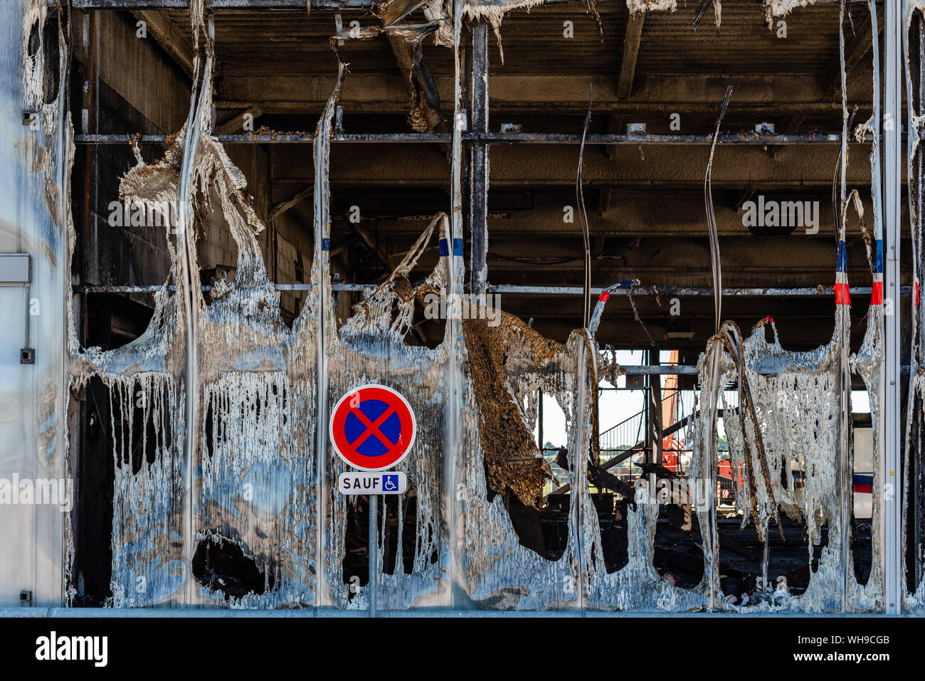 Ruins of modern industrial building after fire. Stock Photo