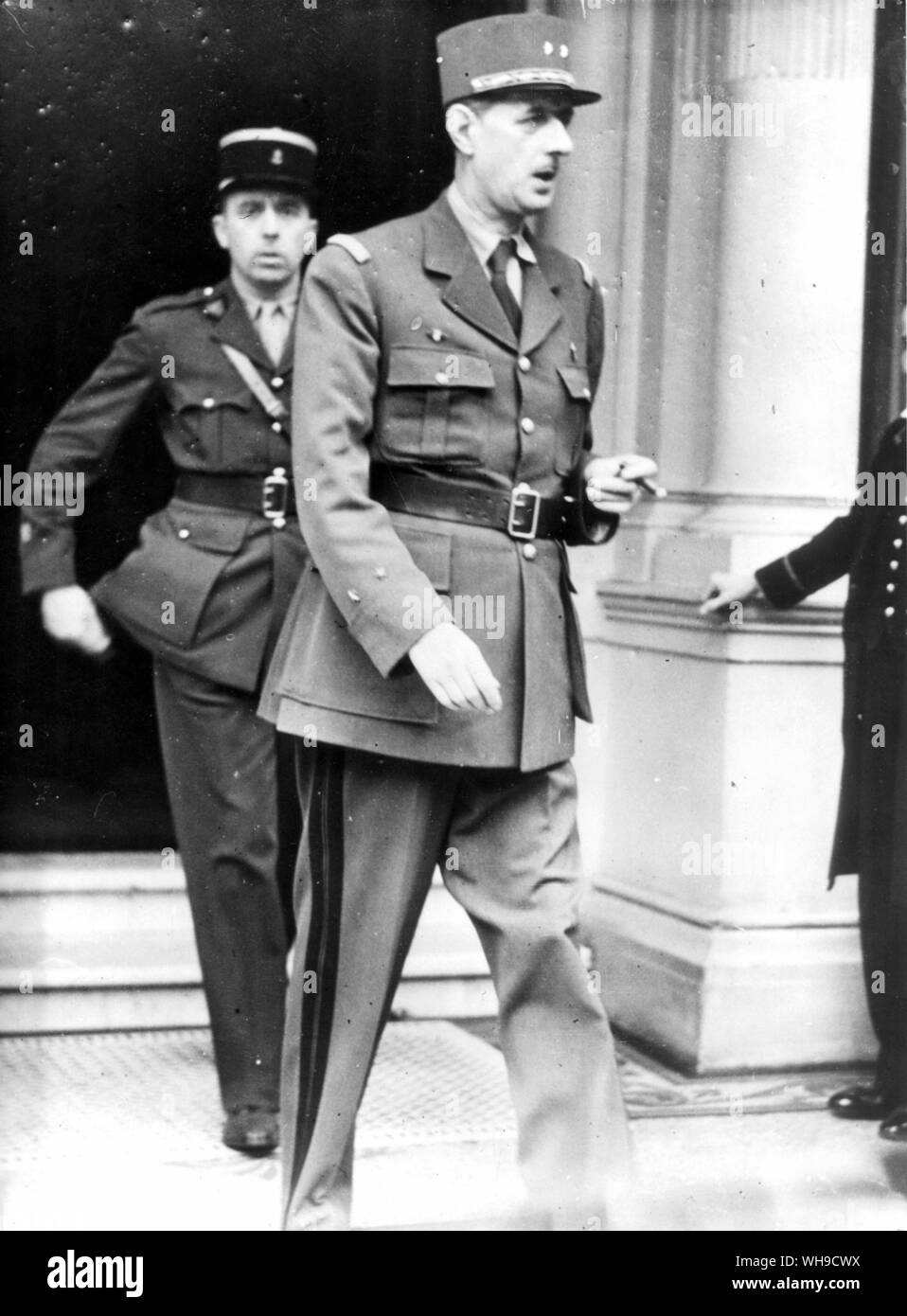 General Charles de Gaulle (1890-1970). French General and first president of the Fifth Republic 1958-69. Leaving his hotel on the morning of D-Day. (ie. not having been given warning of D-Day by the allies). Stock Photo