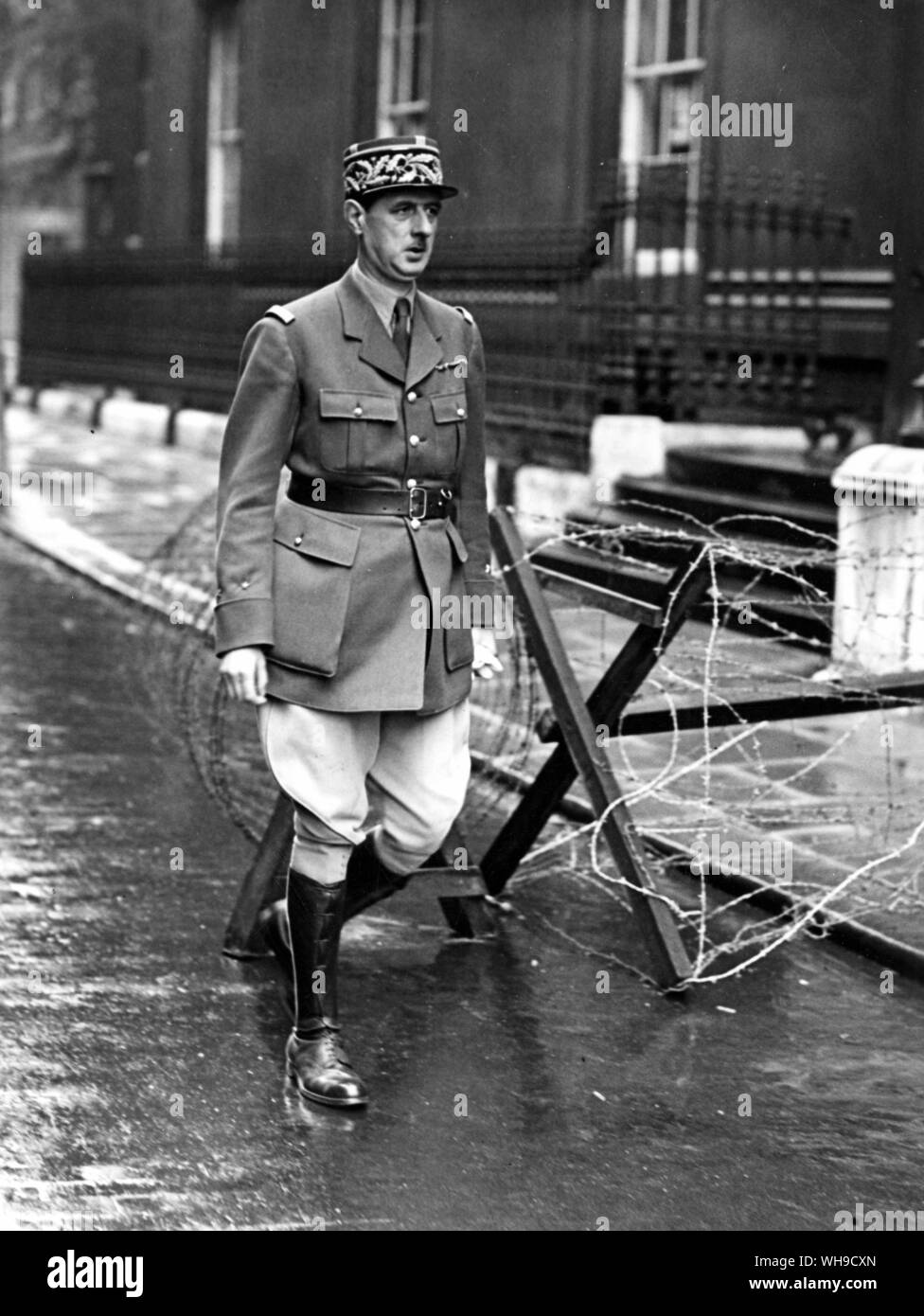 General Charles de Gaulle (1890-1970). French General and first French president of the Fifth Republic, 1958-69. Photographed leaving Downing Street after a dramatic broadcast that France and Germany signed an armistice, June 1940. Stock Photo