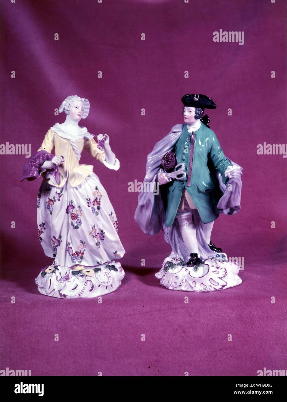 Continental Figurine Tailor and Seamstress Stock Photo