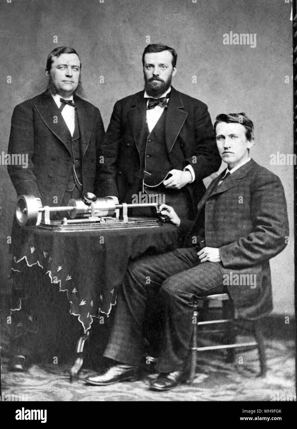 Thomas A Edison (1847-1931) (right, seated) with Charles Bachelor (centre) and Uriah Painter (left) in 1878 on a trip to Washington to demonstrate the phongraph to President. Stock Photo