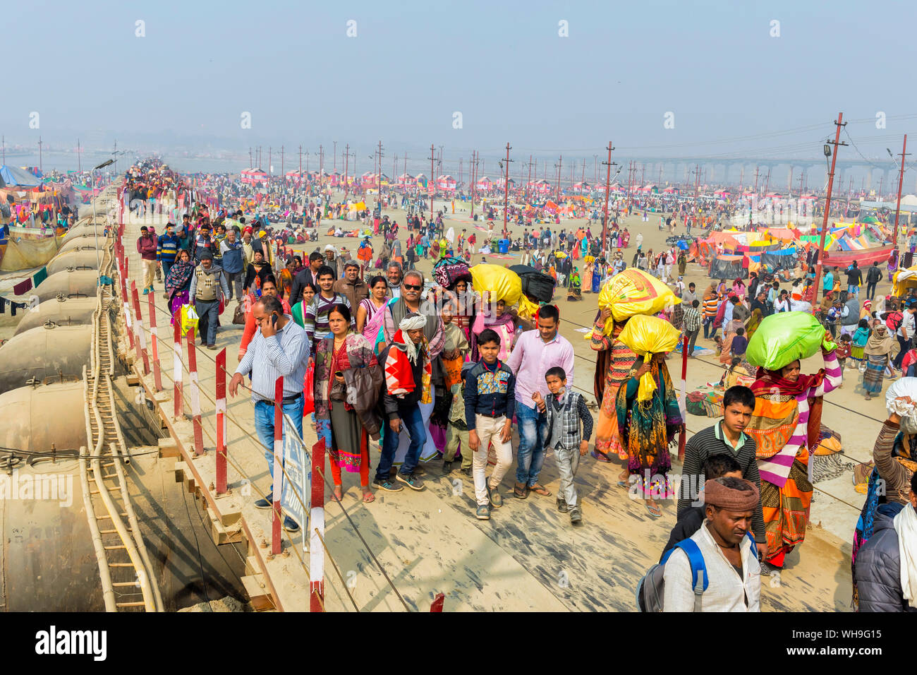 Pilgrims on the way to Allahabad Kumbh Mela, World's largest religious gathering, Allahabad, Uttar Pradesh, India, Asia Stock Photo