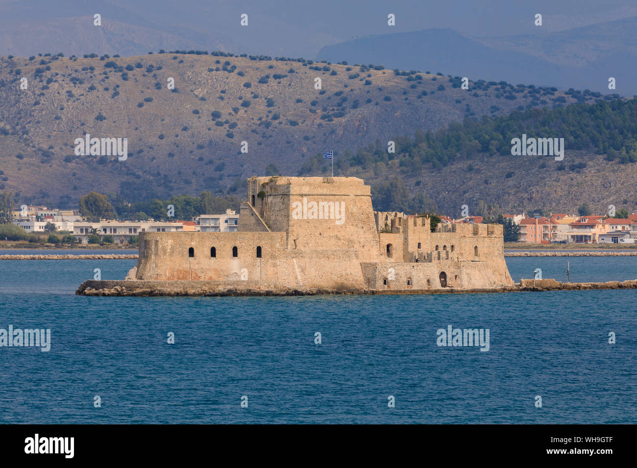 Sunlit Venetian Bourtzi Fortress, island, Nafplio (Nafplion), near Argos, Argolic Gulf, eastern Peloponnese, Greece, Europe Stock Photo