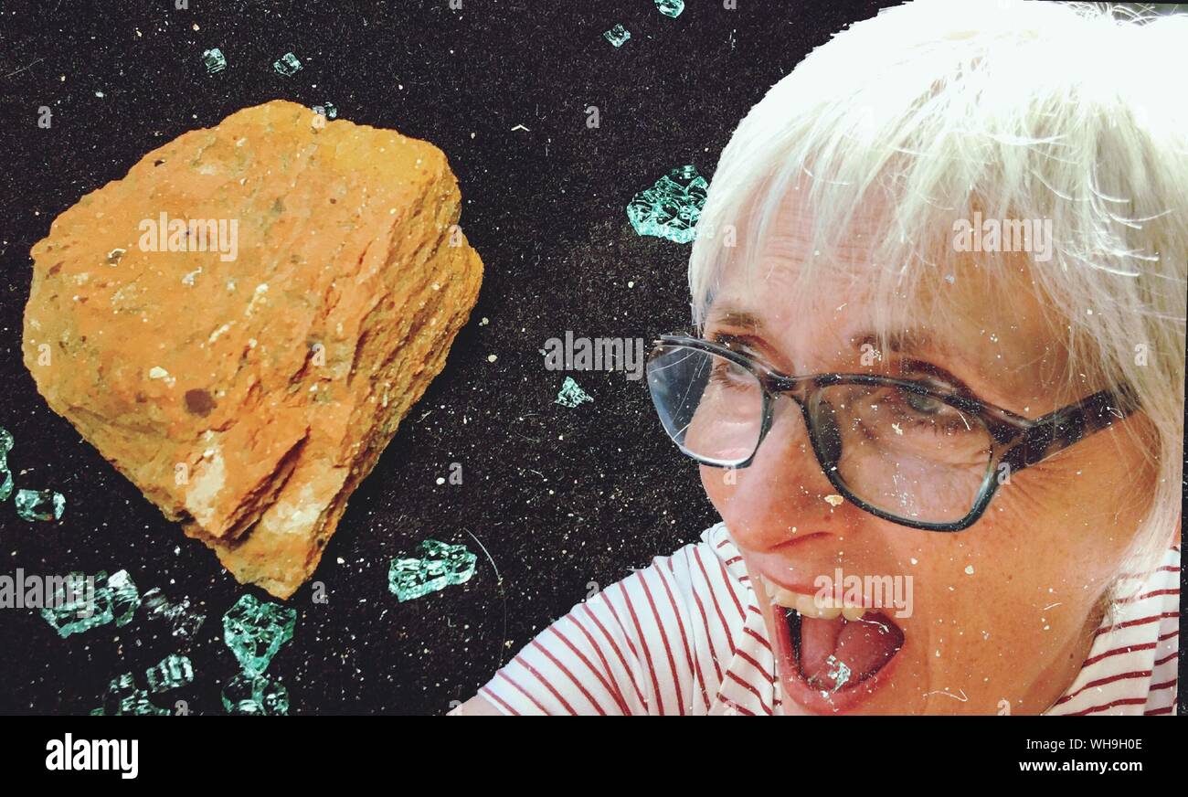Digital Composite Image Of Shocked Woman And Rock Stock Photo