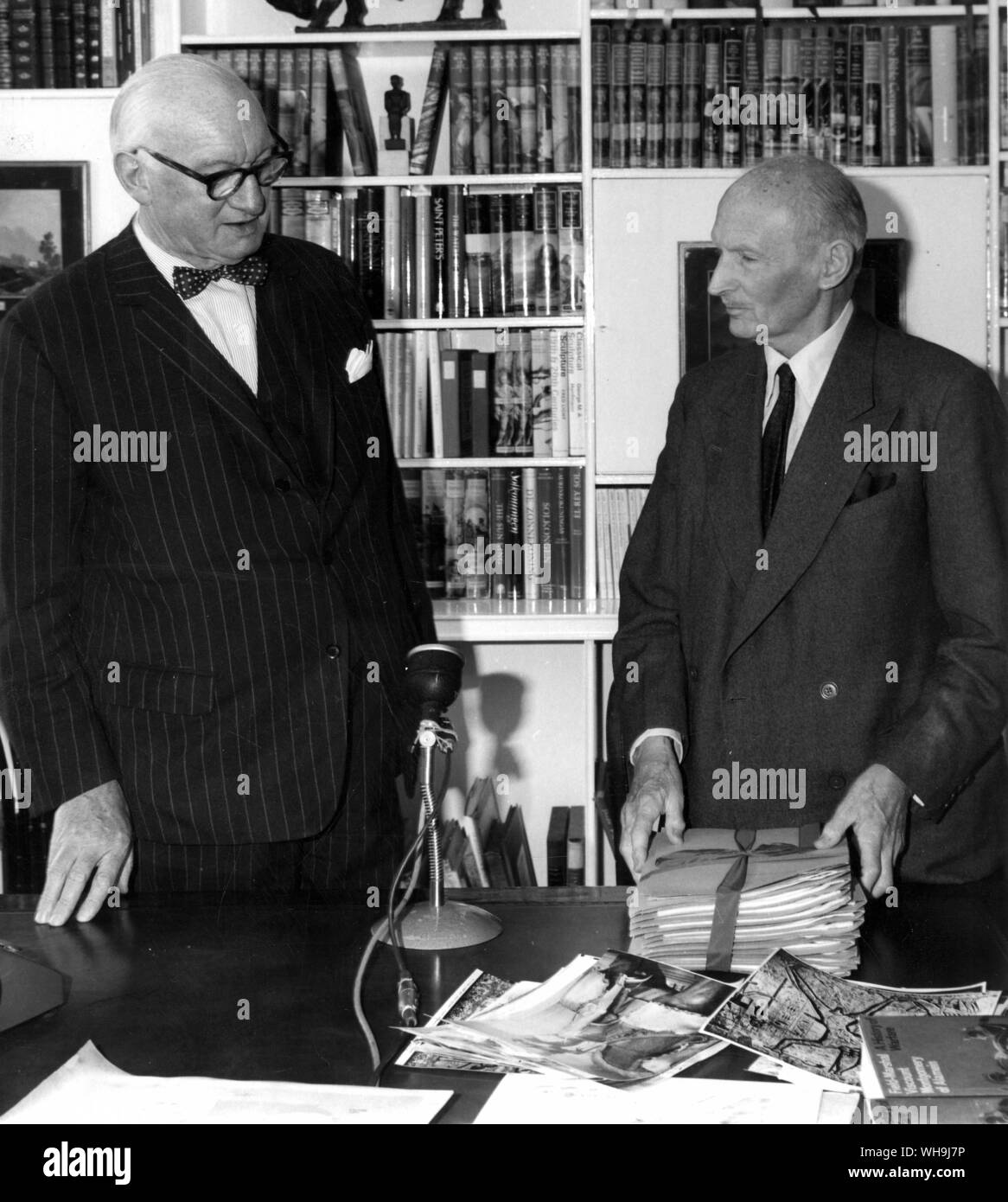 1968: Lord Montgomery, Bernard Law Montgomery (1887-1976) prepares to hand over his transcript of his History of earfare to Mr George Rainbird whose firm is designing and producing the book fo international publication. 1st Viscount Montgomery was a Field Marshal in World War II and commanded the British army in North Africa. Stock Photo