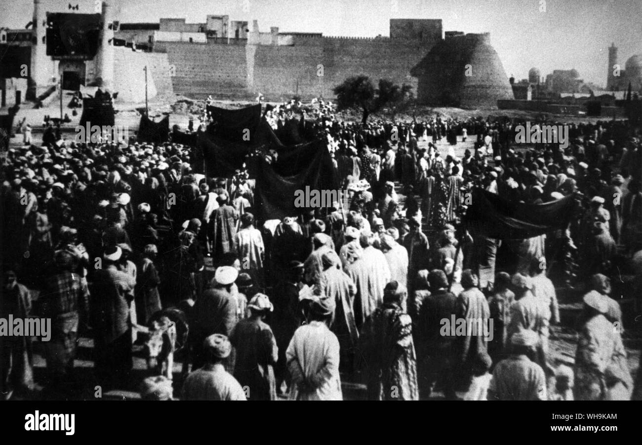 The Ark, Bukhara and Tower of Death (right background). 'Meeting of the working people of old Bukhara held for the elections to the Soviets, Uzbets SSR, 1927.' Stock Photo