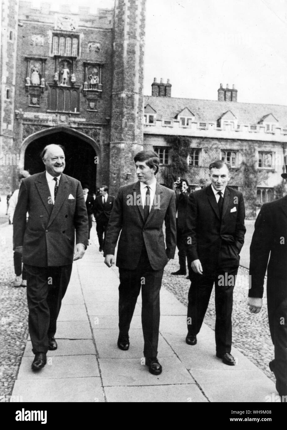 '8th October 1967: Prince Charles arrives at Cambridge. He is 19 yrs old next month. He walks across the quadrangle at Cambridge yesterday, with Lord Butler and Head Tutor, Dr. Denis Marrian.' Stock Photo